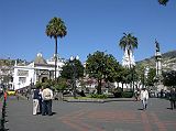 Ecuador Quito 02-03 Old Quito Plaza Grande Cathedral and Virgin On El Panecillo Here is a view from Quitos Plaza Grande of El Panecillo on the hill on the left with its statue of the Virgin Mary, the Cathedral, and the Liberty Statue on the right.